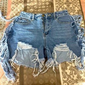 Distressed denim shorts